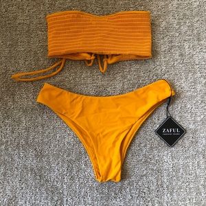 Smocked yellow swimsuit NWT